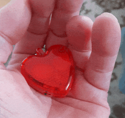 Beating heart keyring light, red, orange and yellow